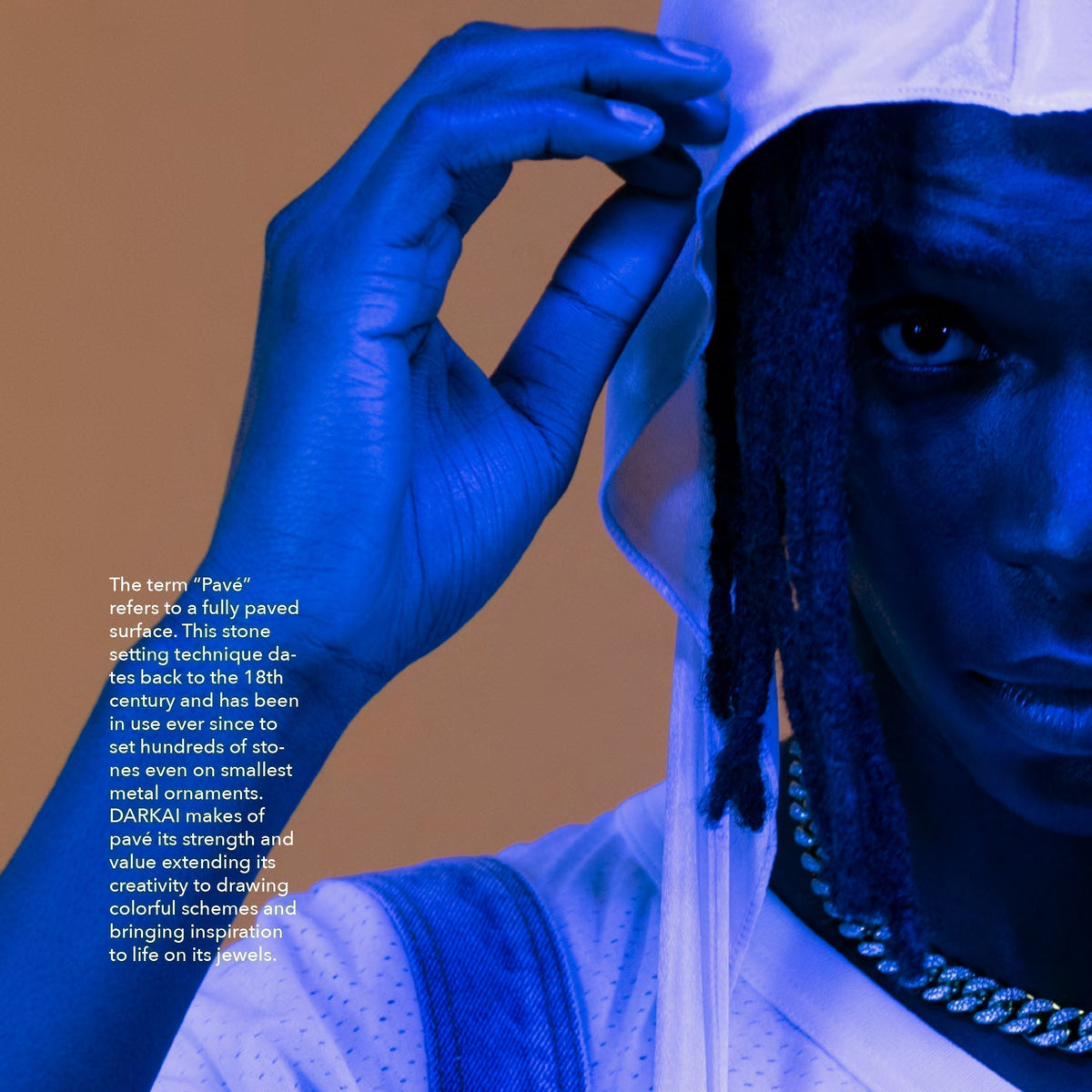 DARKAI 90s Kids Lookbook FW23 Man wearing gold cuban chains with diamonds