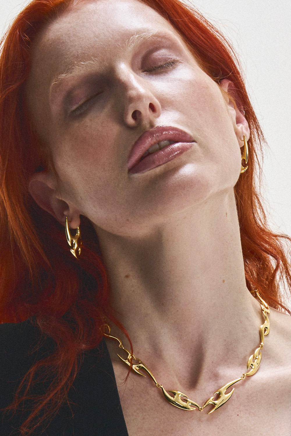DARKAI Tribal Gold Earrings On Female Model